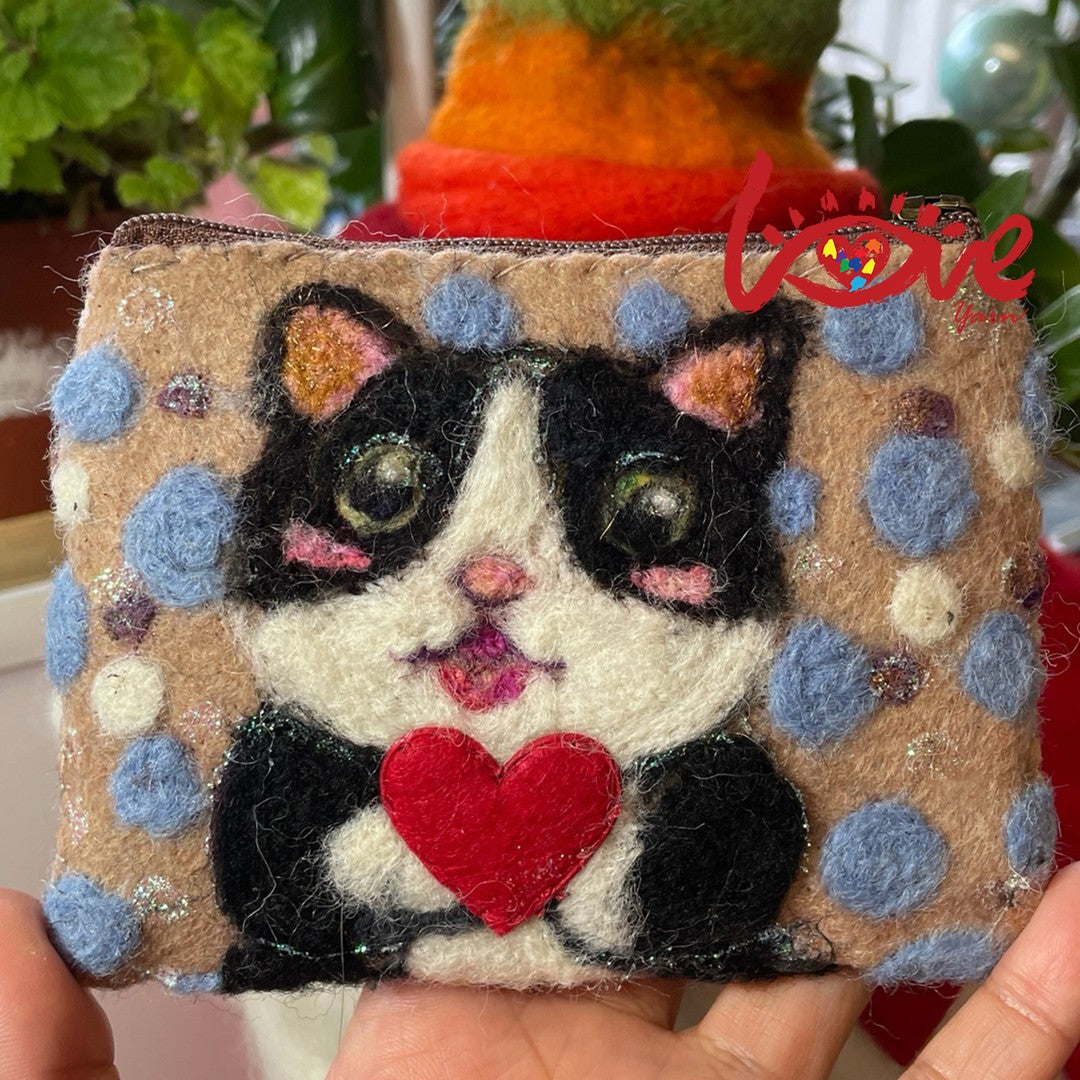 A cat with a sweet heart (dots)