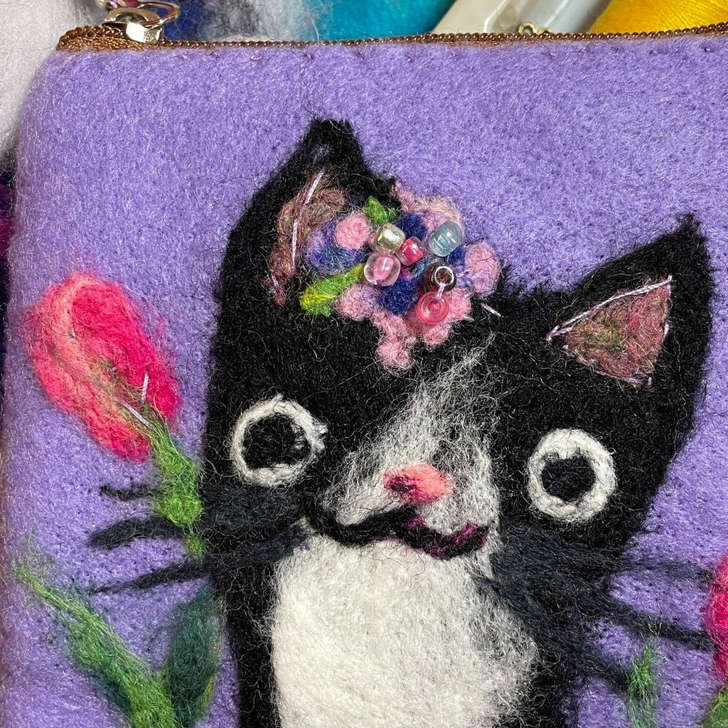 A cat with tulips