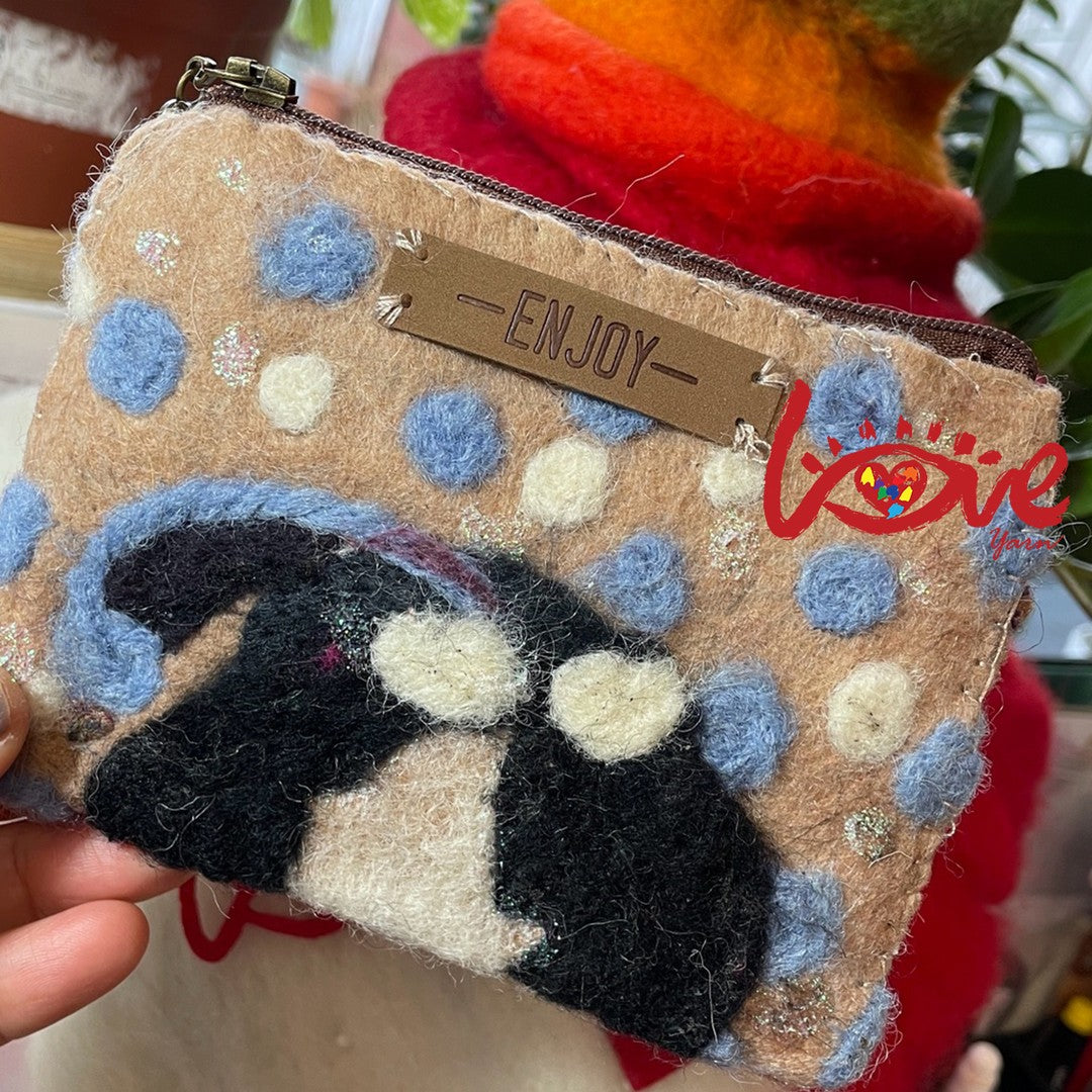 A cat with a sweet heart (dots)