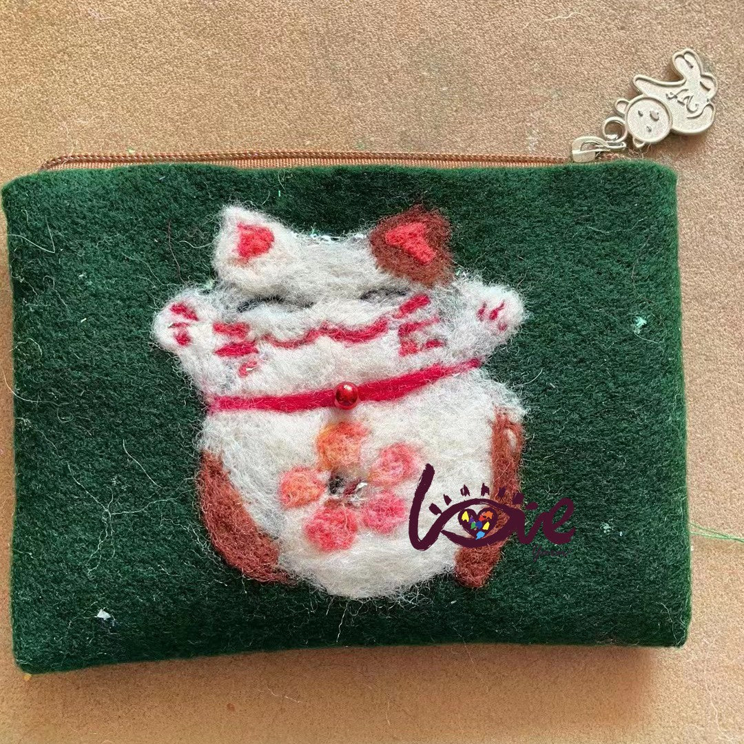 Lucky cat with a pink flower