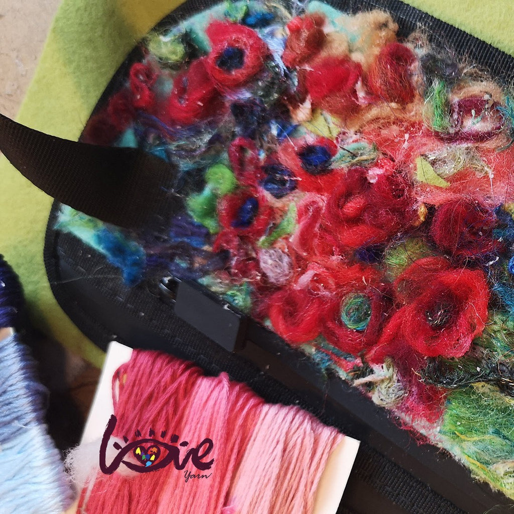 Red flowers on a messenger bag
