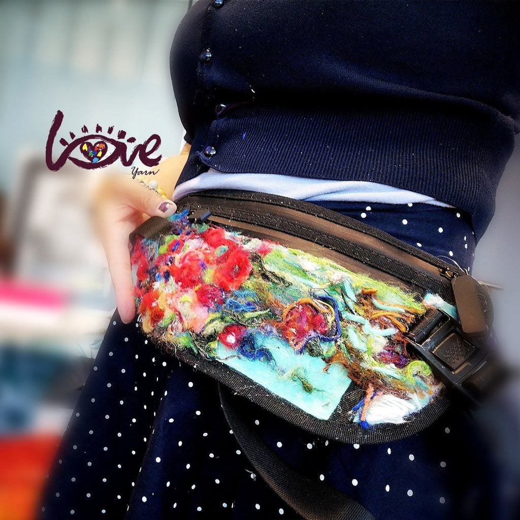 Red flowers on a messenger bag