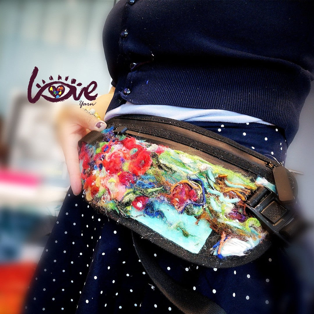 Red flowers on a messenger bag