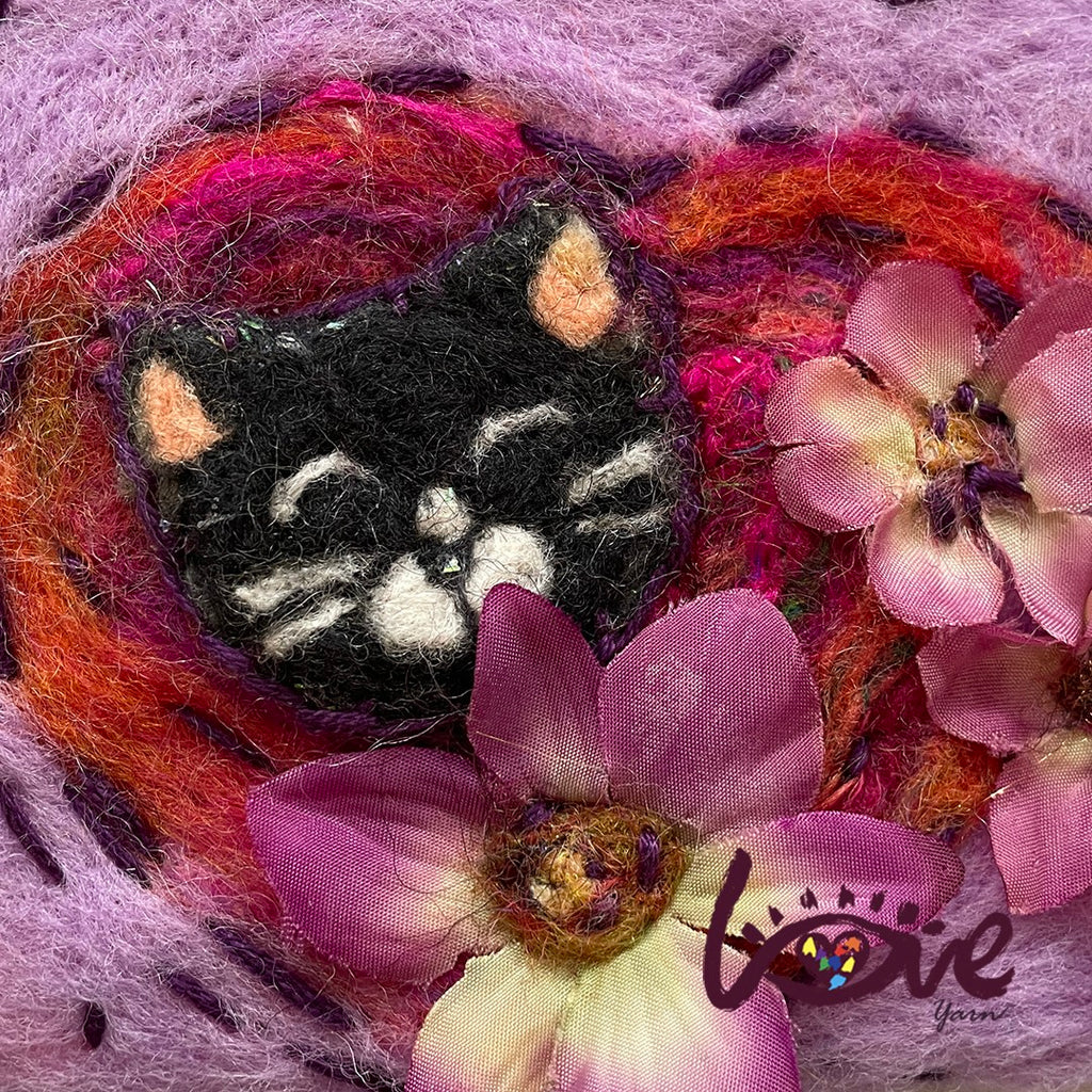 A cat in the flowers