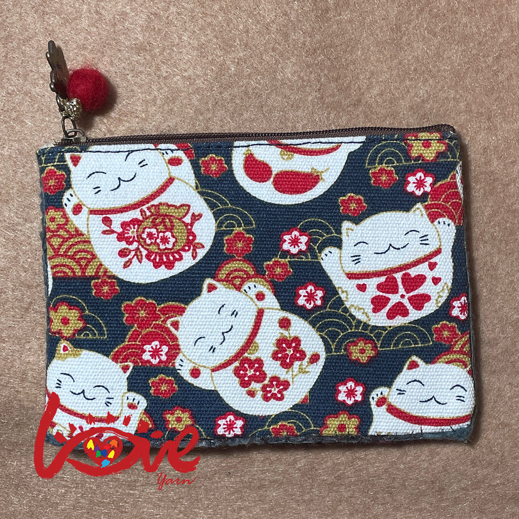 Lucky cat with the scarf