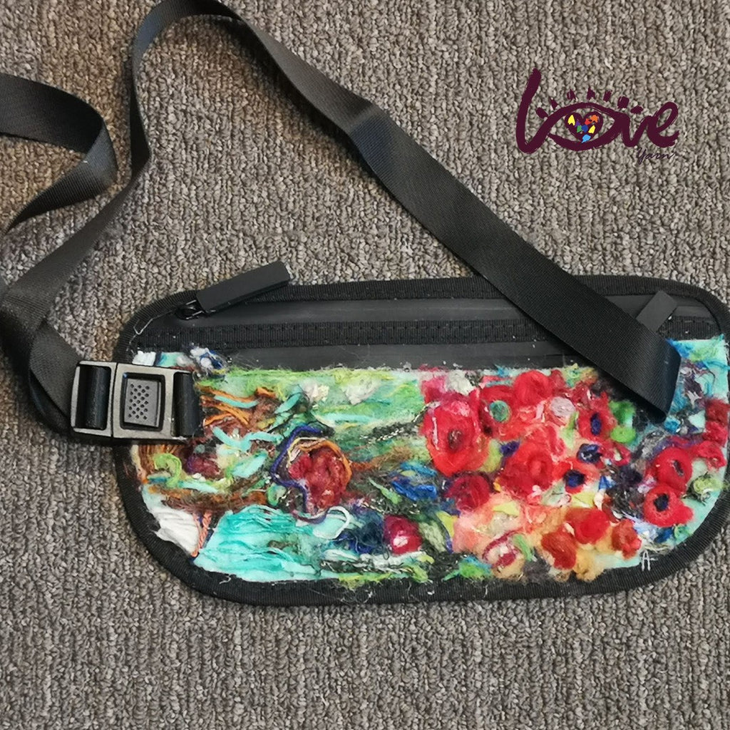 Red flowers on a messenger bag