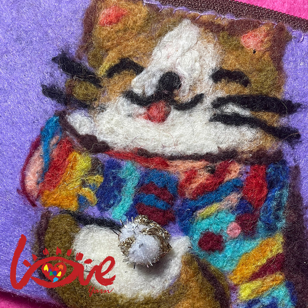A Cat with colorful scarf