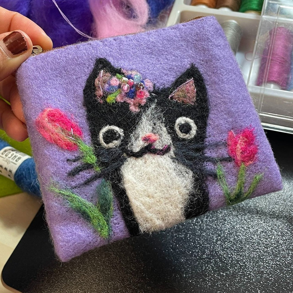 A cat with tulips