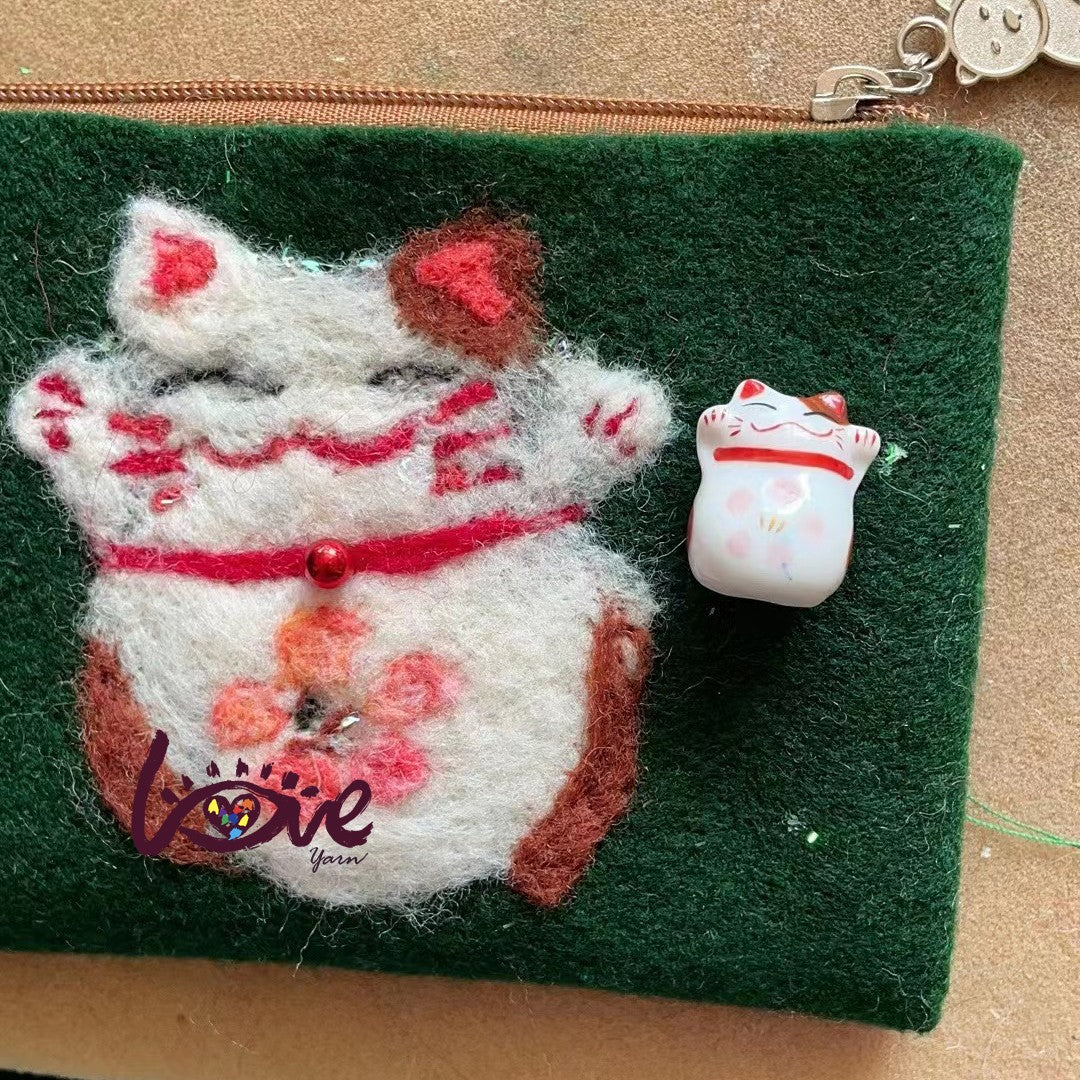 Lucky cat with a pink flower
