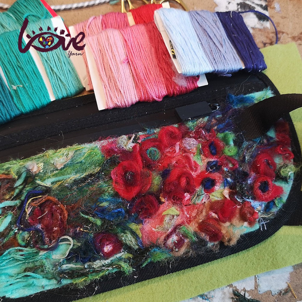 Red flowers on a messenger bag