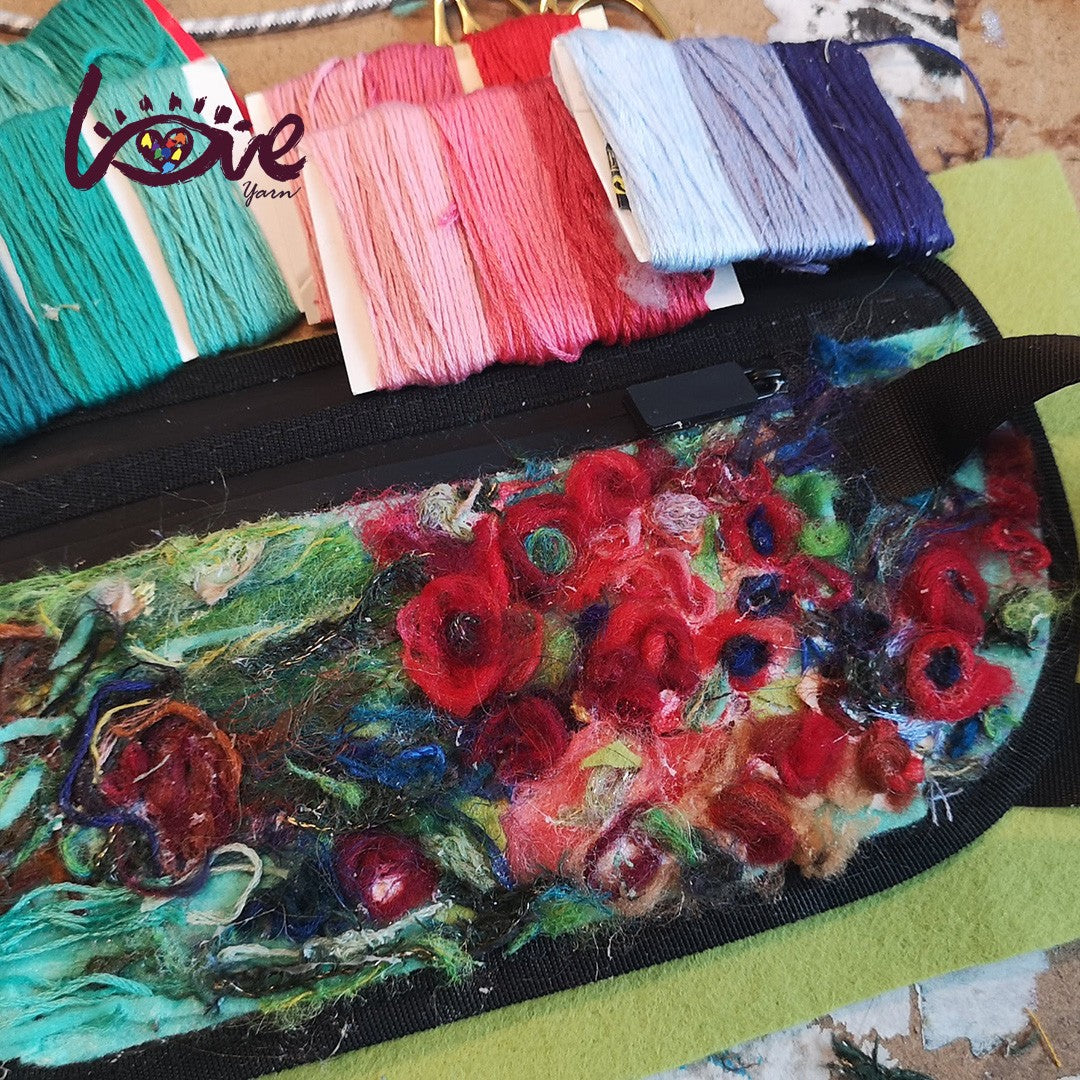 Red flowers on a messenger bag