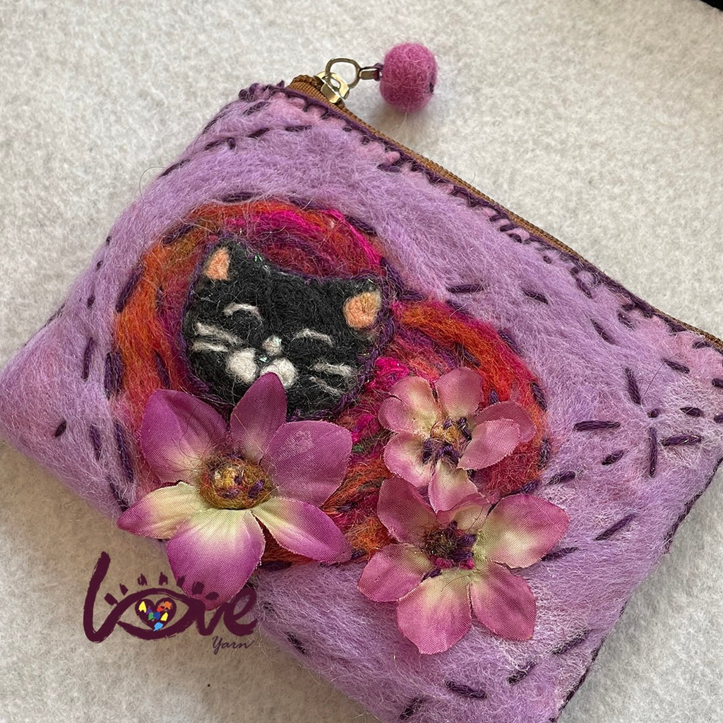 A cat in the flowers