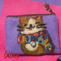 A Cat with colorful scarf